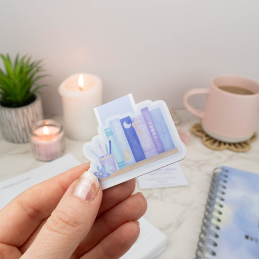 Magnetic bookmark, little row of books with a key. 